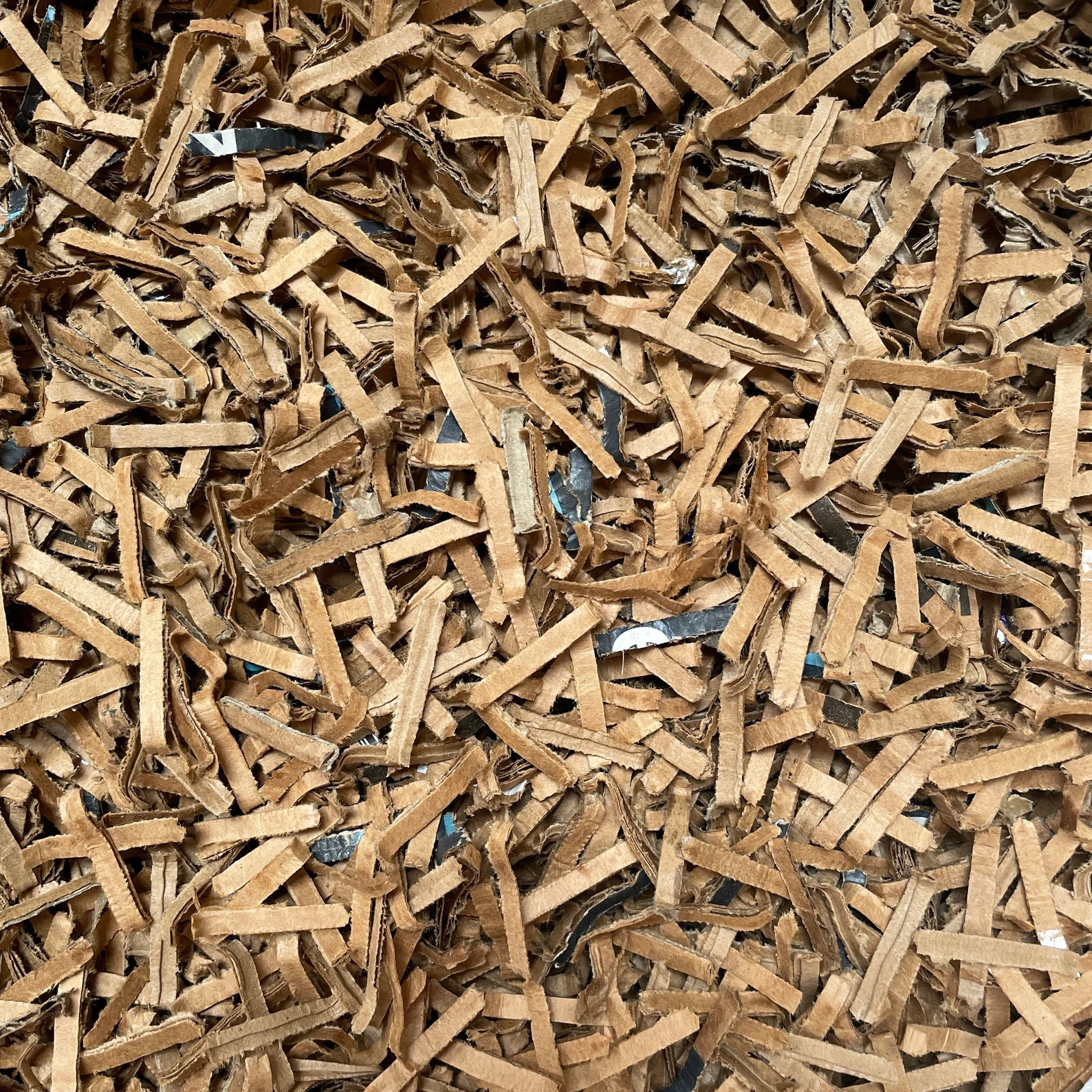 Recycled cardboard shred used as packaging void fill